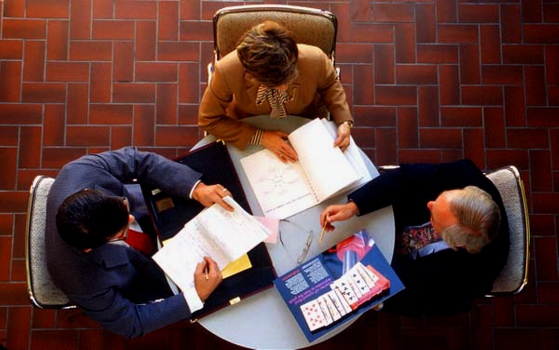 business meeting from above books
